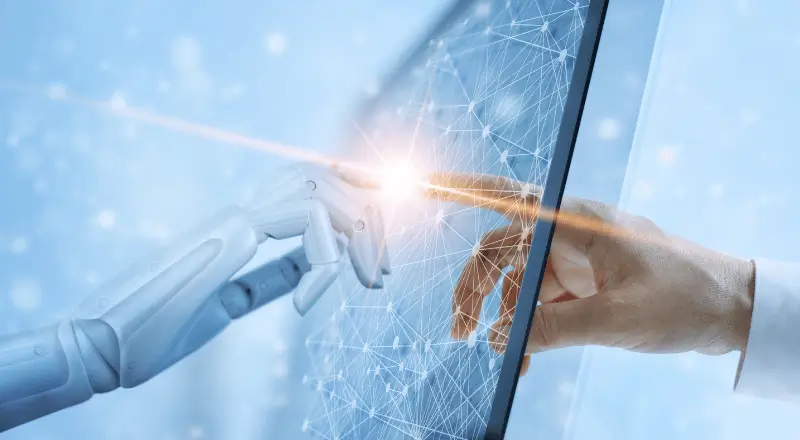 Robô e humano tocando uma tela de computador.
