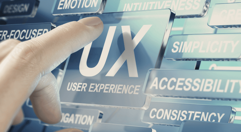 SEO & Experiência do Usuário (UX): Foque Sempre no Usuário Mão clicando em um botão no qual está escrito UX.